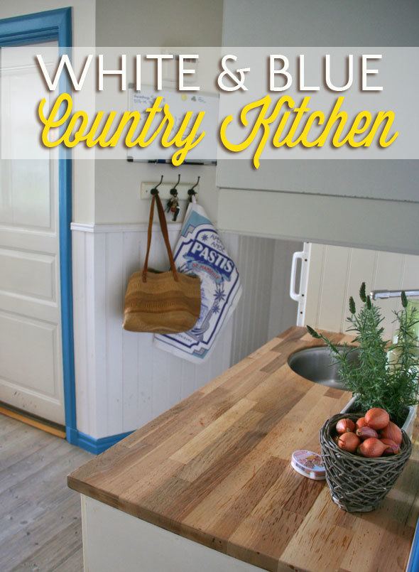 white & blue country kitchen in a Swedish mansion