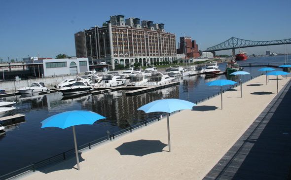 Montreal boats & umbrellas, as seen on at https://skimbacolifestyle.com/2013/07/montreal-bike-tour.html