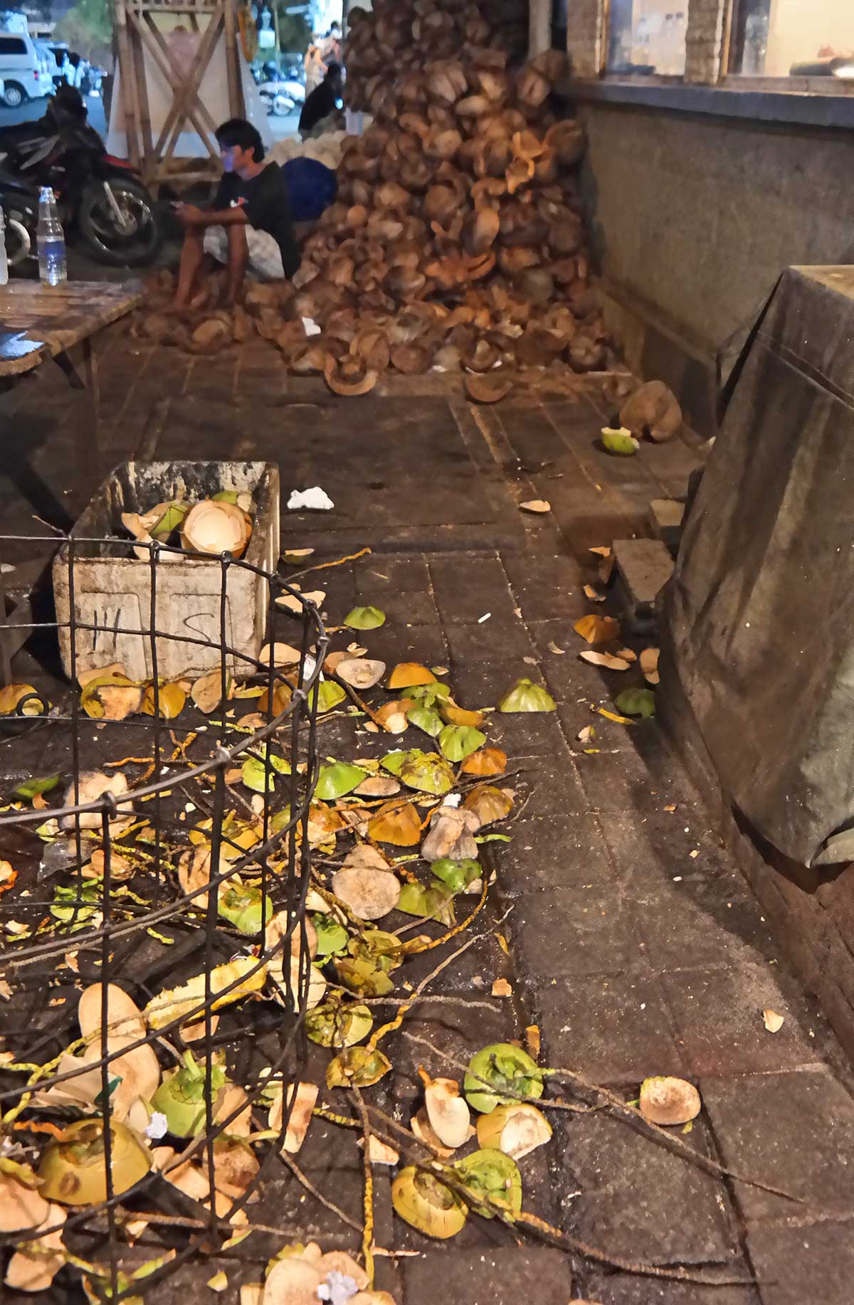 coconut shells on the street in Jimbaran, Bali