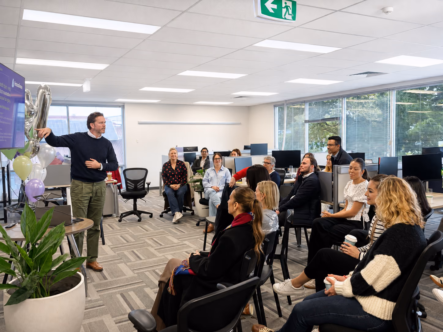The Visualcare team gathered in the office for a team session