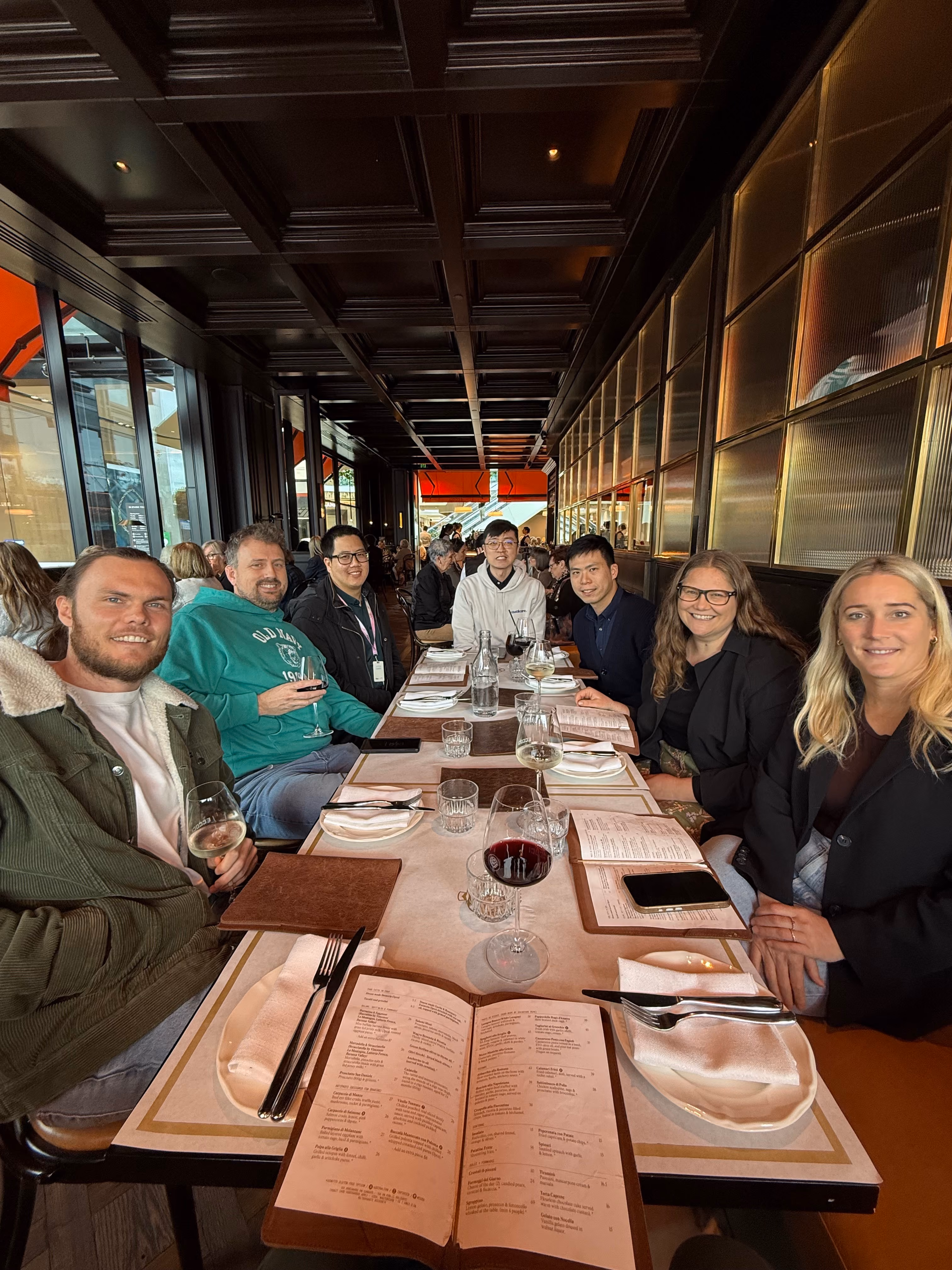 The team sharing a meal together