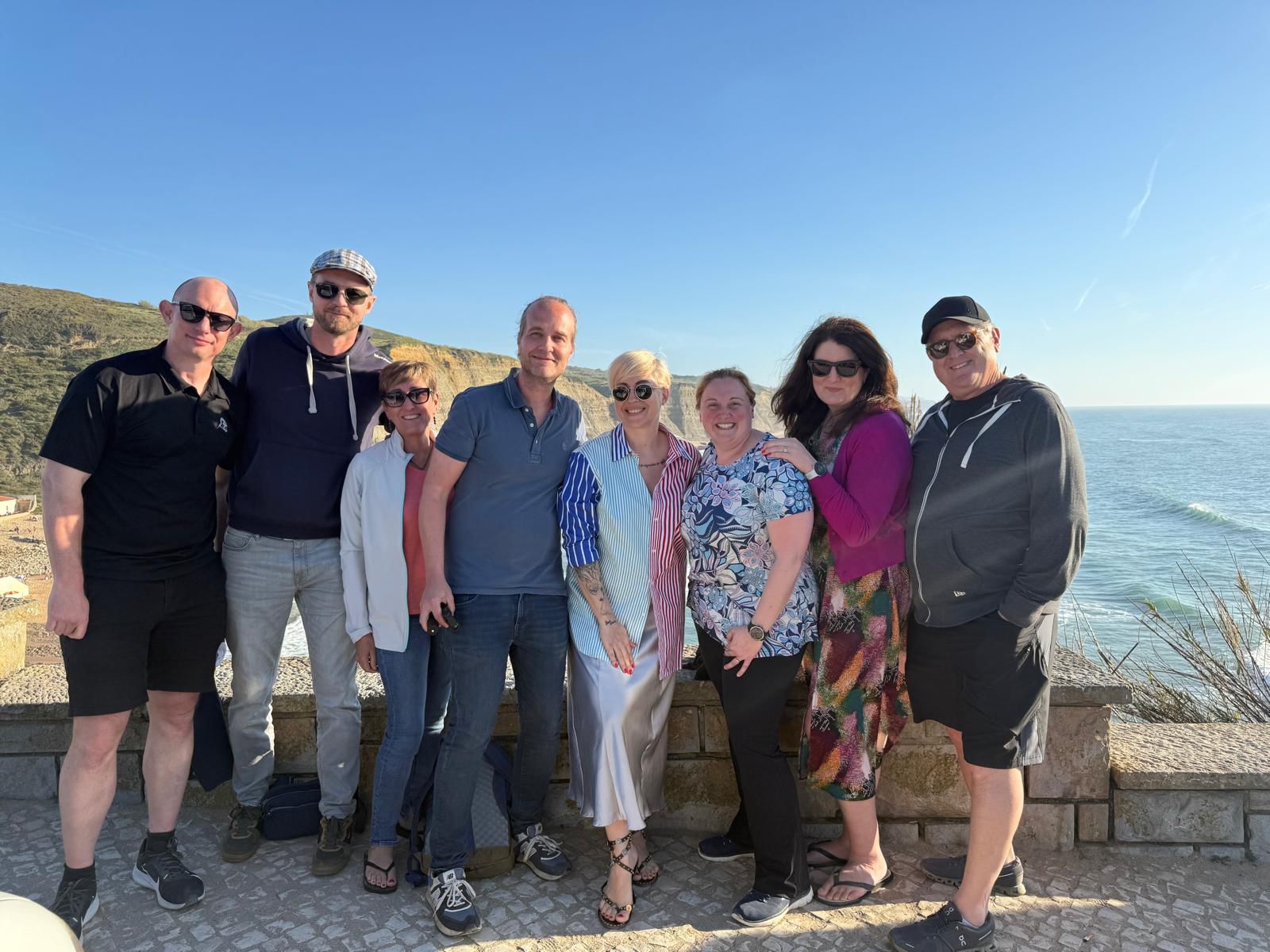 Sintra Synergies April 2026: group photo at Praia do Magoito
