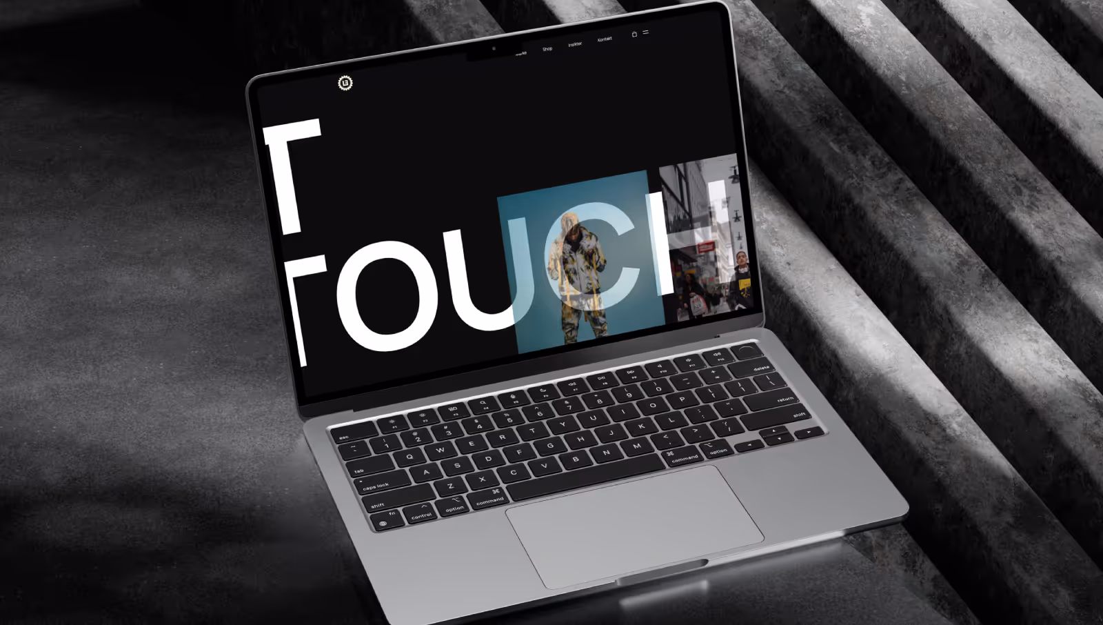 Mockup av Mackbook som visar Lenigma Sweden's hemsida