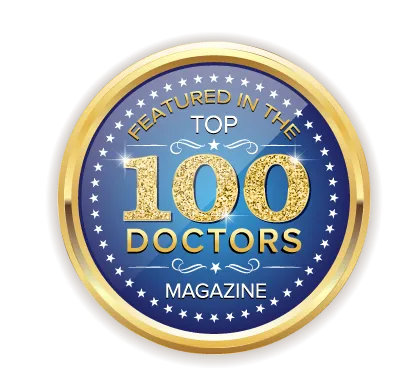 Gold and blue circular badge stating 'Featured in the Top 100 Doctors Magazine' with stars around the edge.