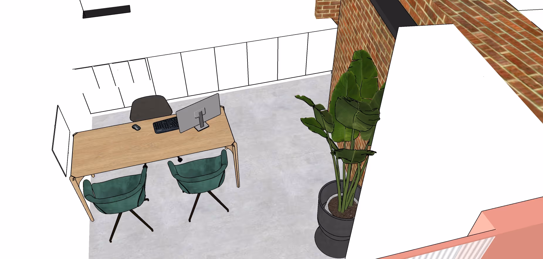 Modern workspace with a wooden desk, two green chairs, a computer monitor, keyboard, mouse, and a large potted plant in an industrial-style room.