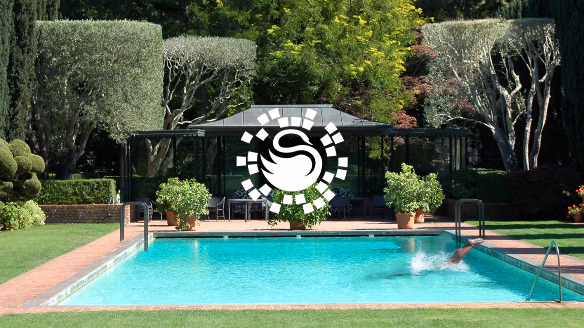 Surrey Swimming Pools logo in white on a background with an outdoor swimming pool and shaped hedges.