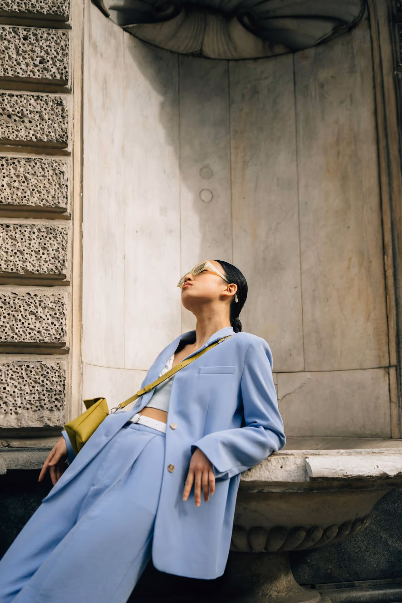 Image of a woman in a blue suit.