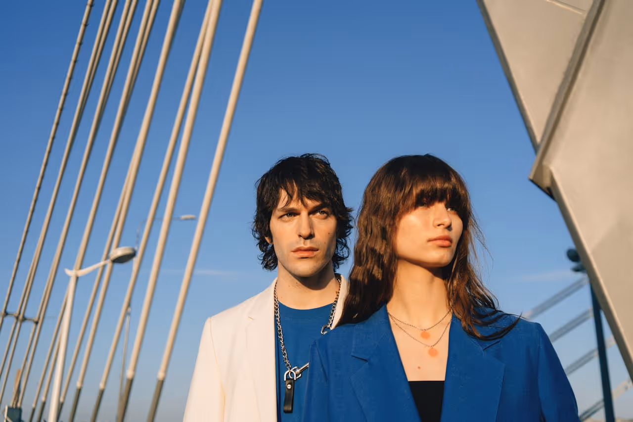 Image of two models wearing suits.
