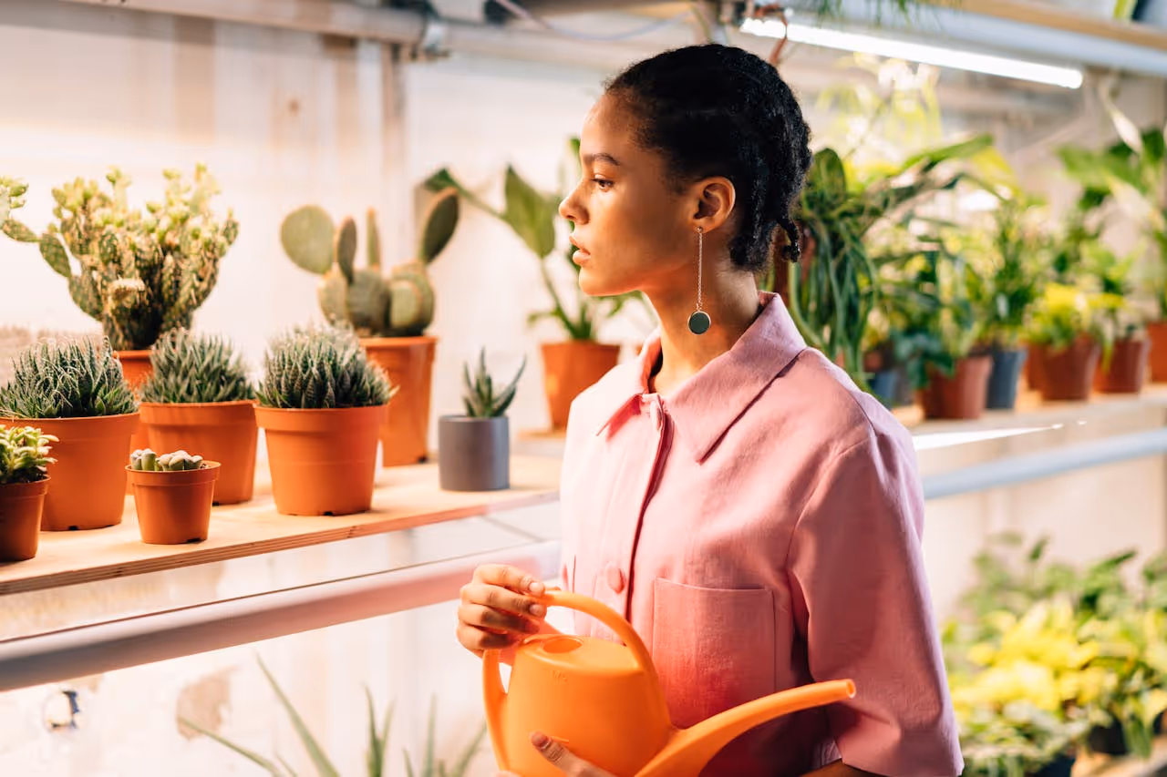 Woman looking at plants.