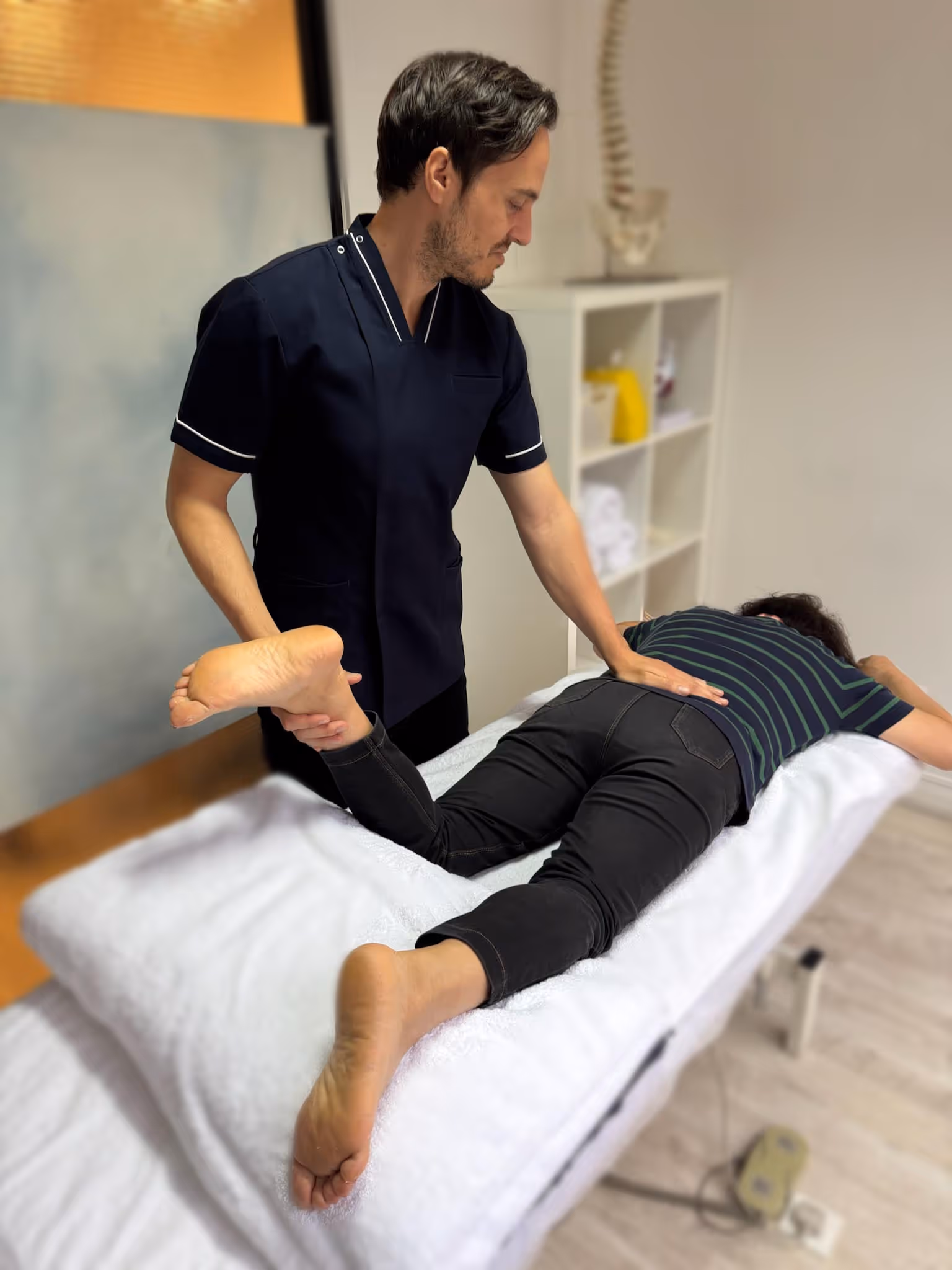 Osteopathic treatment at City Osteopathy showing practitioner performing manual therapy assessment and intervention, demonstrating the clinic's hands-on approach to understanding the body's interconnected systems and addressing functional imbalances