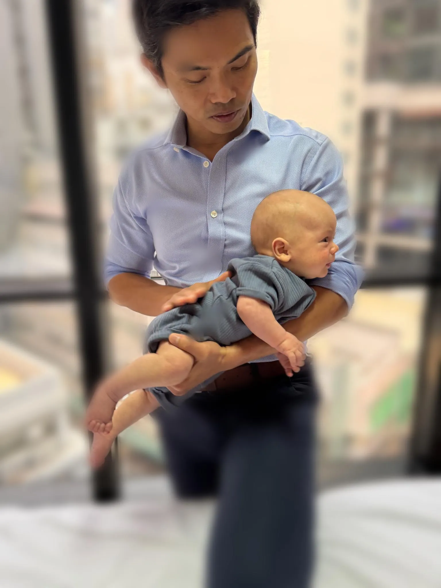 Happy Melons Program consultation at City Osteopathy showing Advanced Paediatric Osteopath with infant patient, demonstrating the clinic's specialist approach to flat head syndrome prevention and early intervention for optimal head shape development