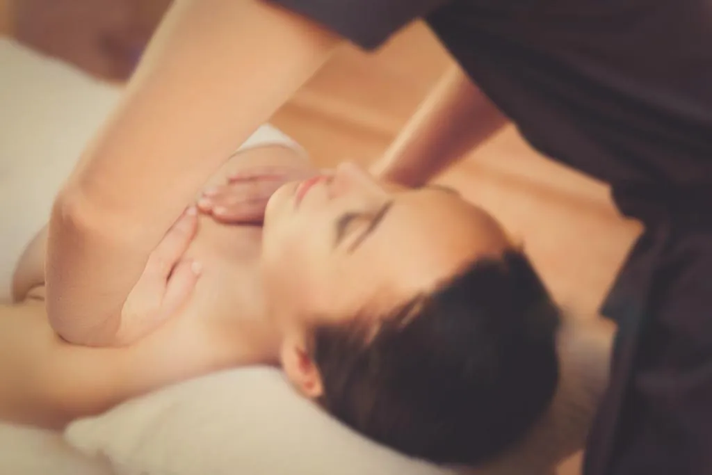 Clinical massage therapy session at City Osteopathy showing precision massage technique for muscular balance and recovery, part of the clinic's integrated healthcare approach