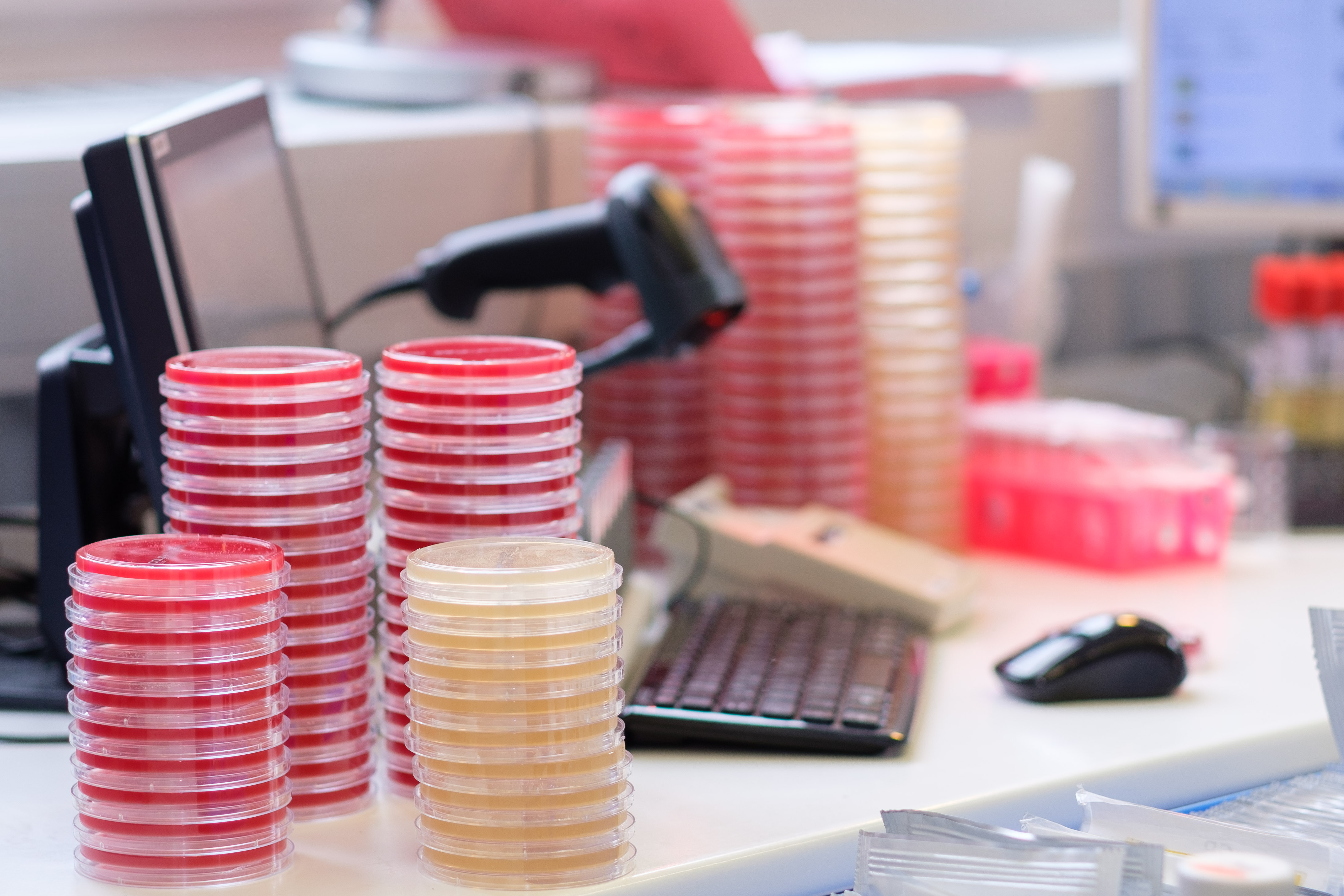 Advanced structural biology laboratory with cryo-EM and spectroscopy equipment