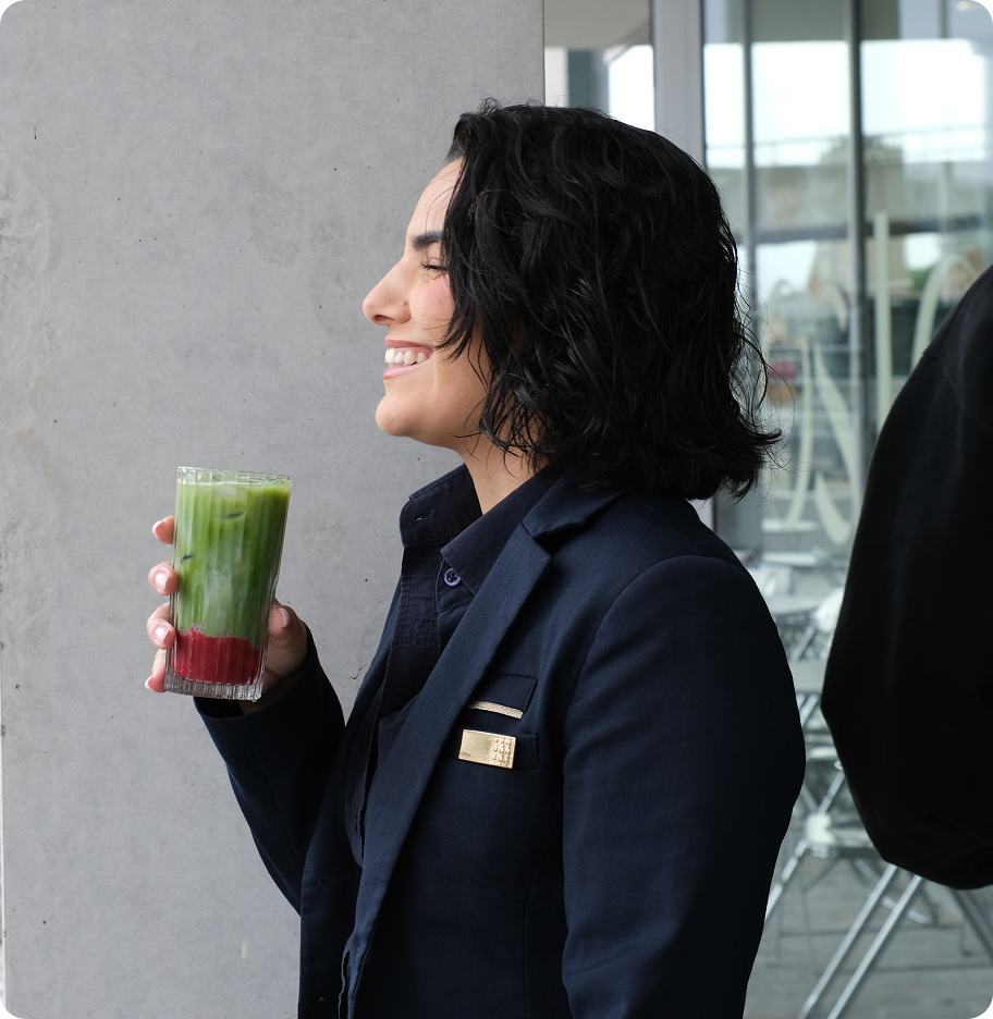 Guest enjoying a matcha latte at Kosto.