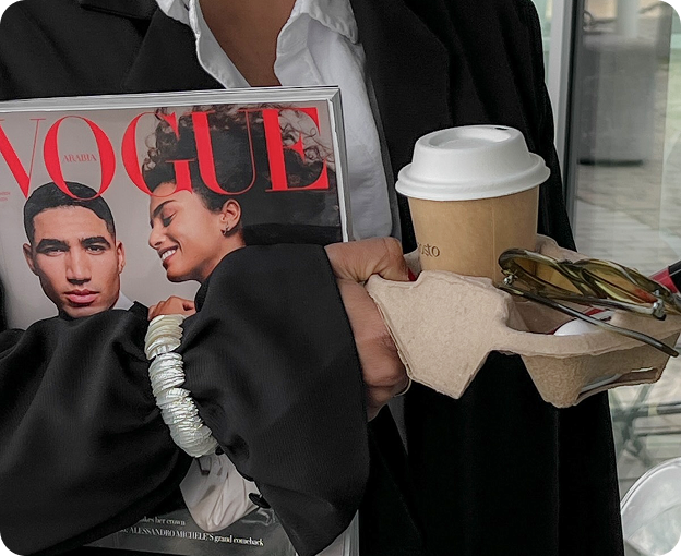 On-the-go breakfast with coffee, croissants and a copy of Vogue.