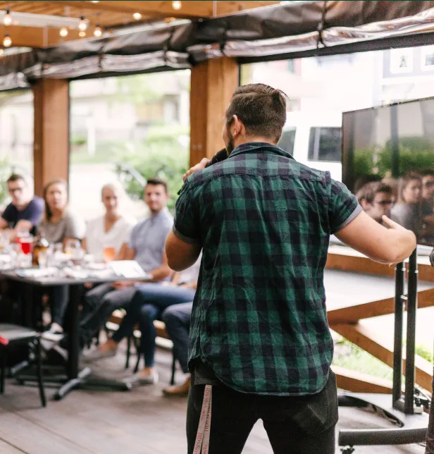 man doing a talk in office