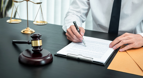 Attorney handling confidential legal documents and client records