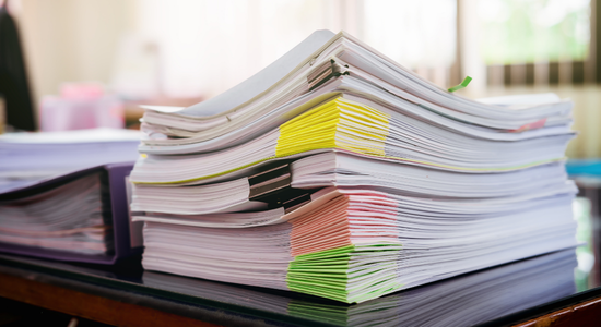 Confidential business documents ready for secure document shredding