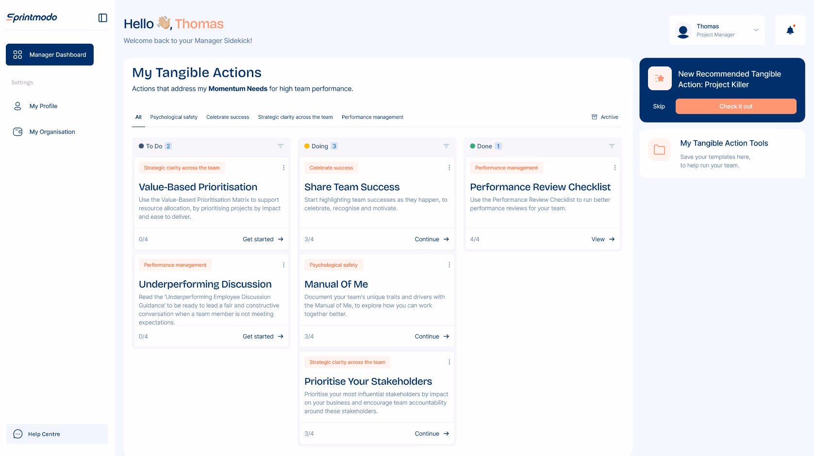 Dashboard interface showing 'My Tangible Actions' with columns labeled To Do, Doing, and Done, displaying tasks such as Value-Based Prioritisation, Share Team Success, and Performance Review Checklist.