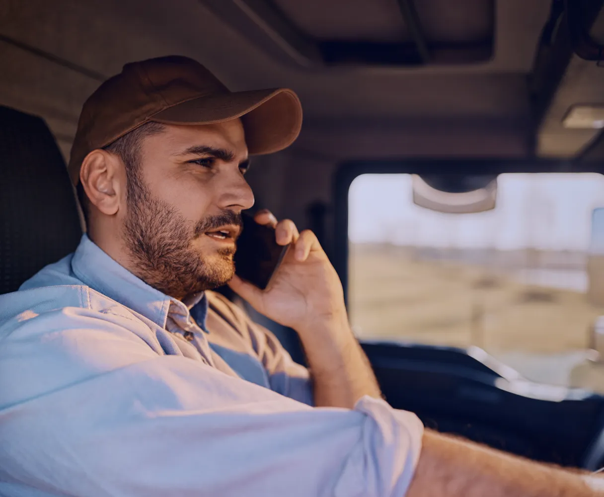 A field service technician utilizing Aquant's voice AI on the way to a job site. 
