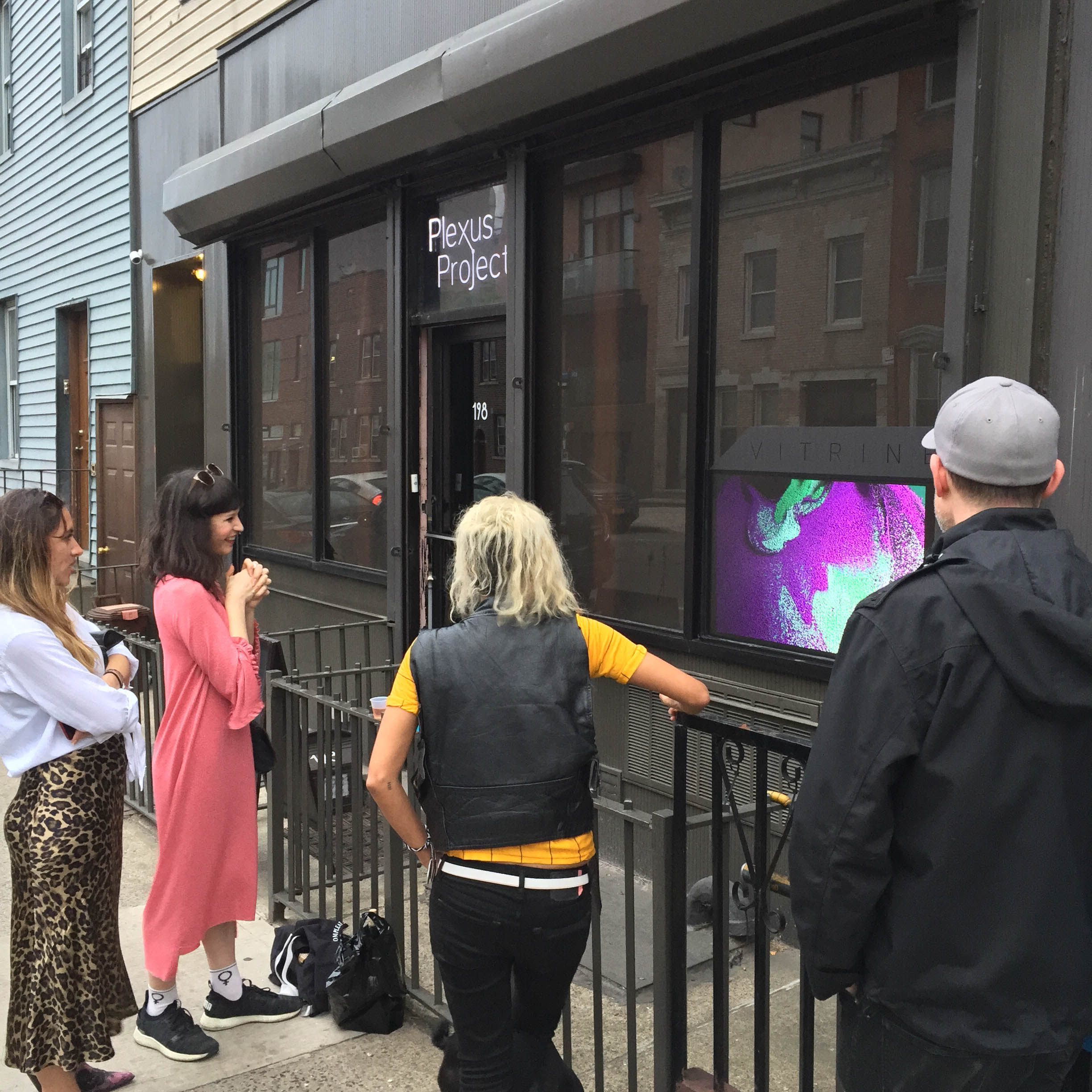 "Vitrine" sidewalk screening for Greenpoint Gallery Night at Plexus Projects