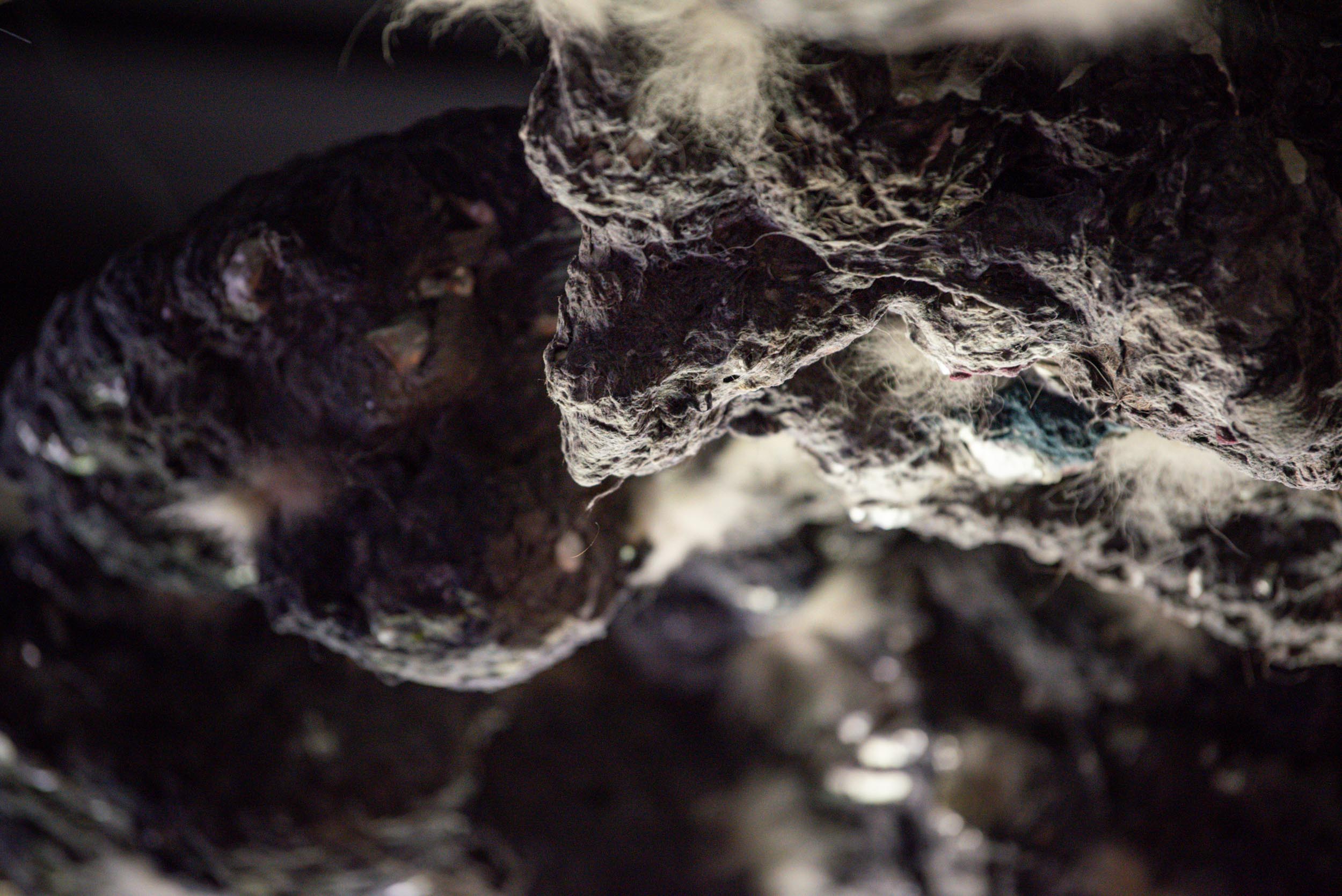 "The Cloud". 2026. multimedia installation with lights, motion sensors, microcontrollers, foam, dryer lint, hair.