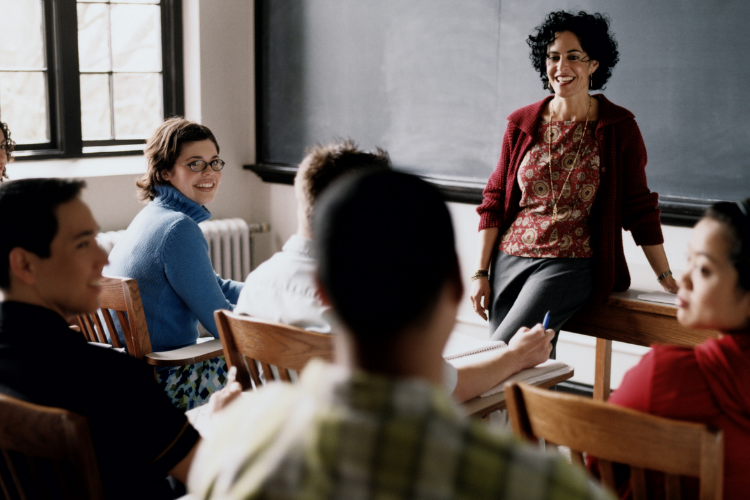 teacher engaging with students
