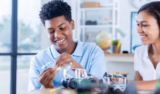 students building model cars