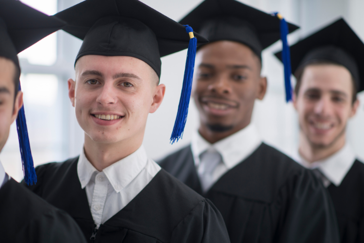 male students graduating