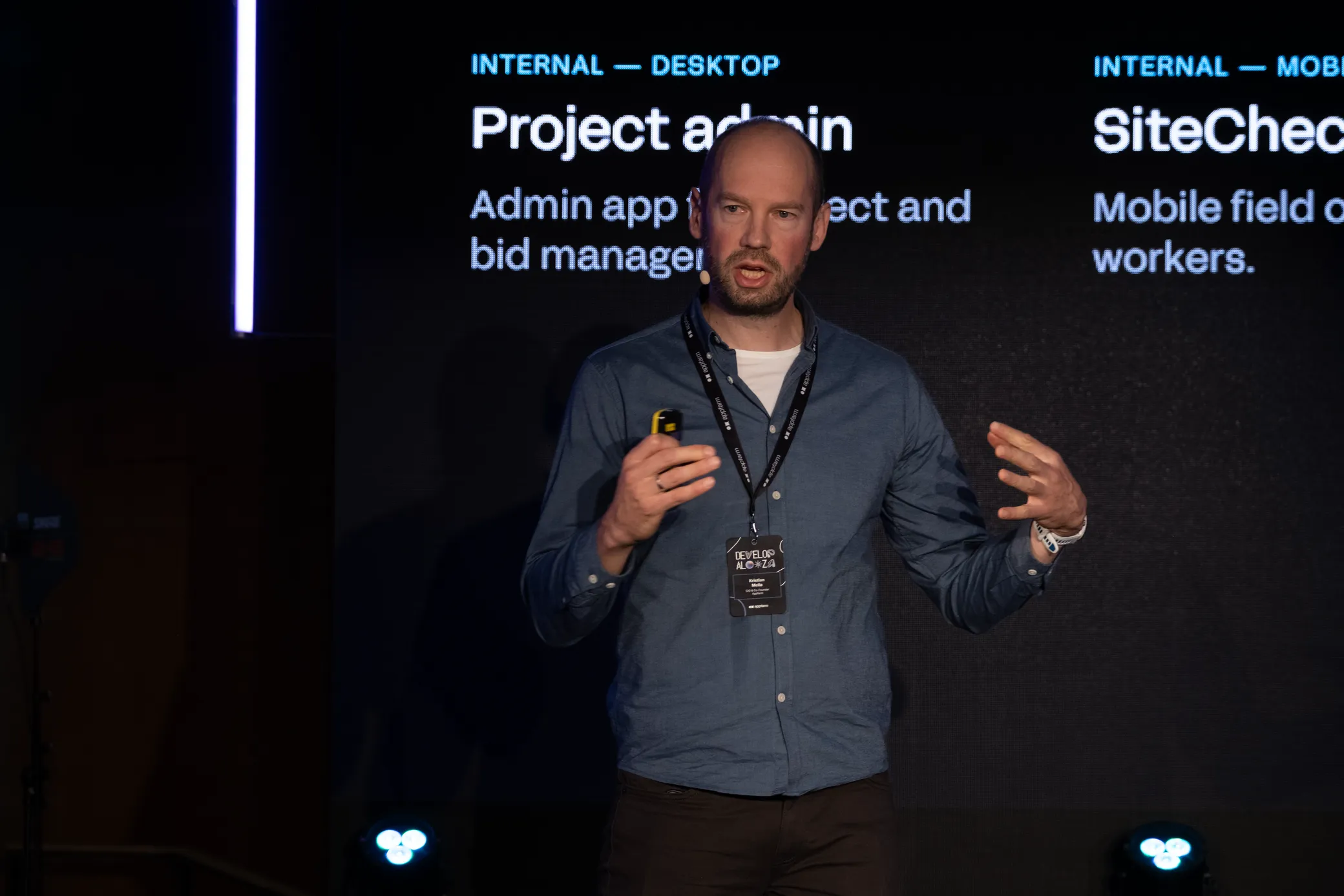 Kristian Mella on stage at Developalooza 2026, presenting the four levels of enterprise AI.