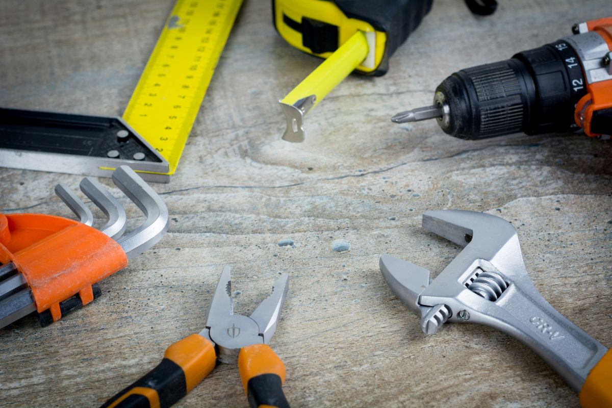 A collection of tools scattered on a table.