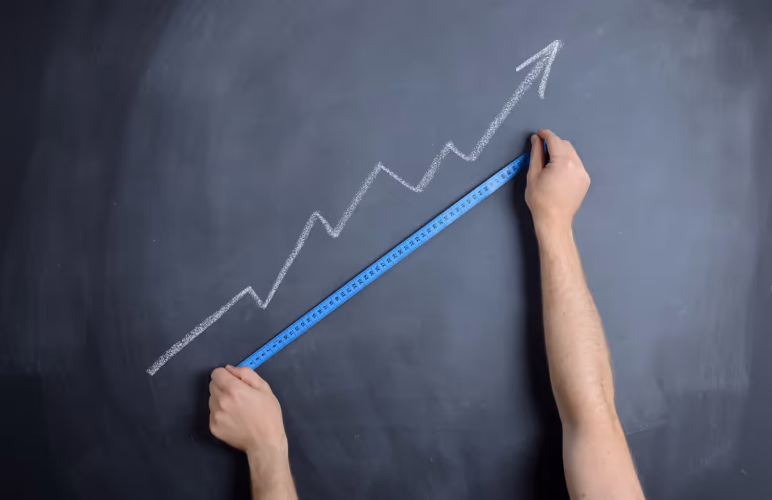 Blue tape measure with arrow going upwards