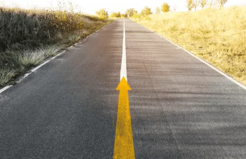 Road with yellow arrow