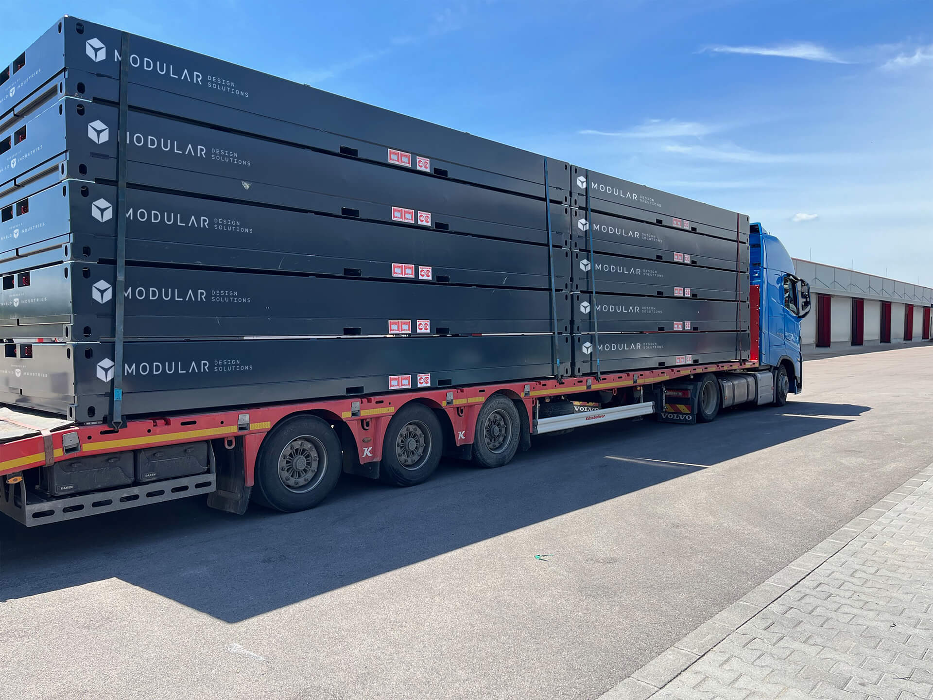 A photo of ten CN20 units being transported on a transport truck.