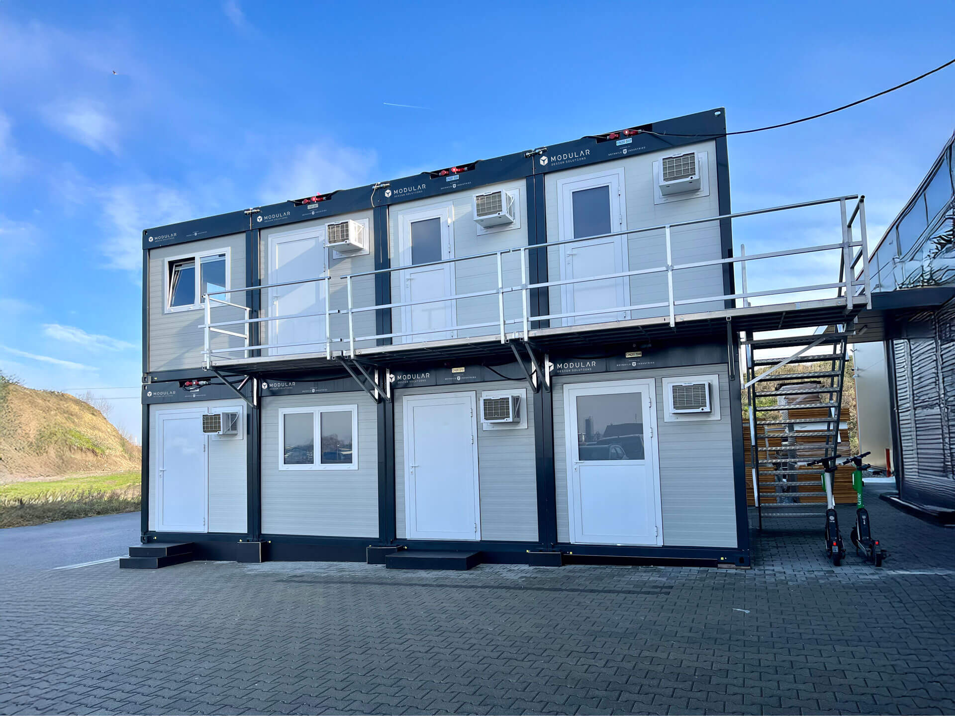 A photo of eight CN20 units linked together and set up for apartments.