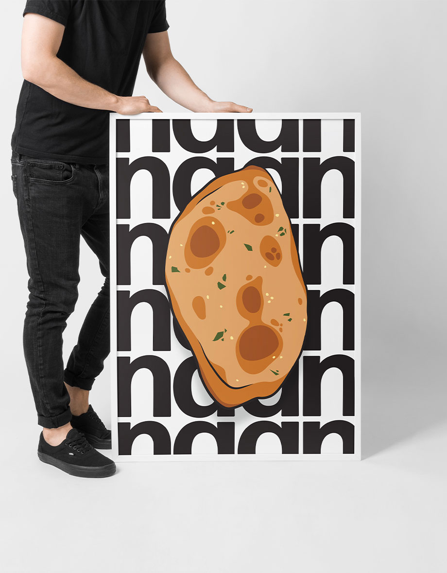 Holding a poster of an illustration of naan