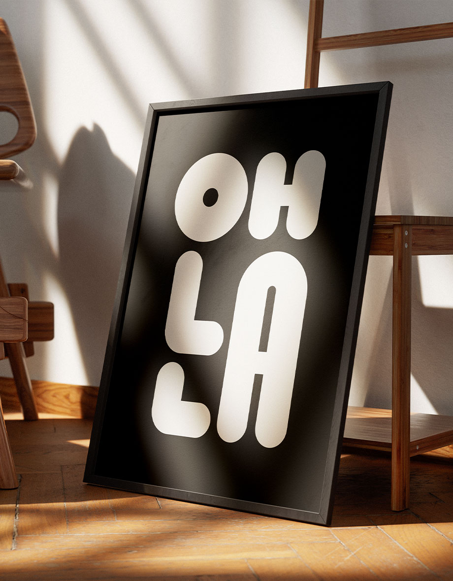 poster leaning against saying oh la la