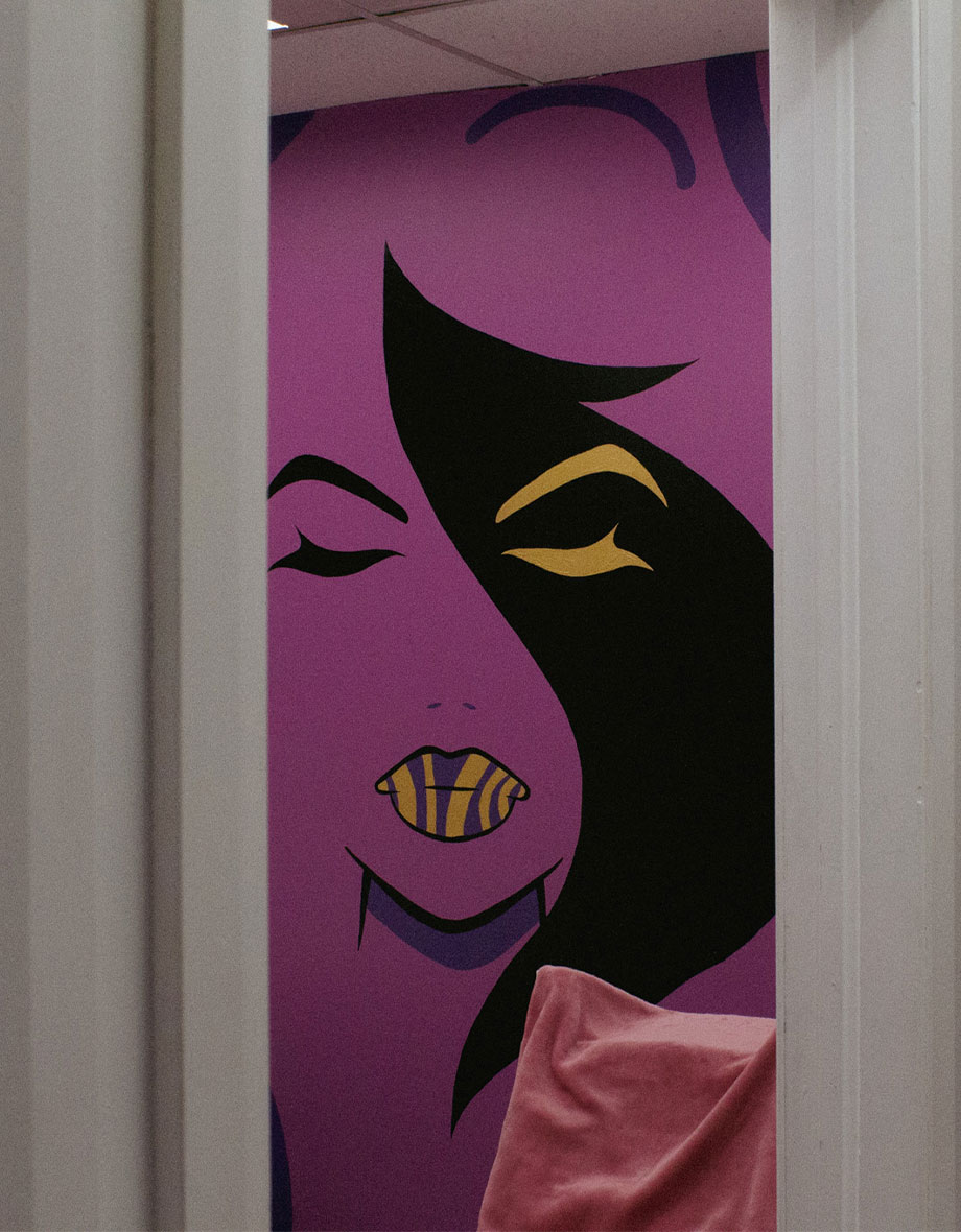 Seeing a mural of a face through a door