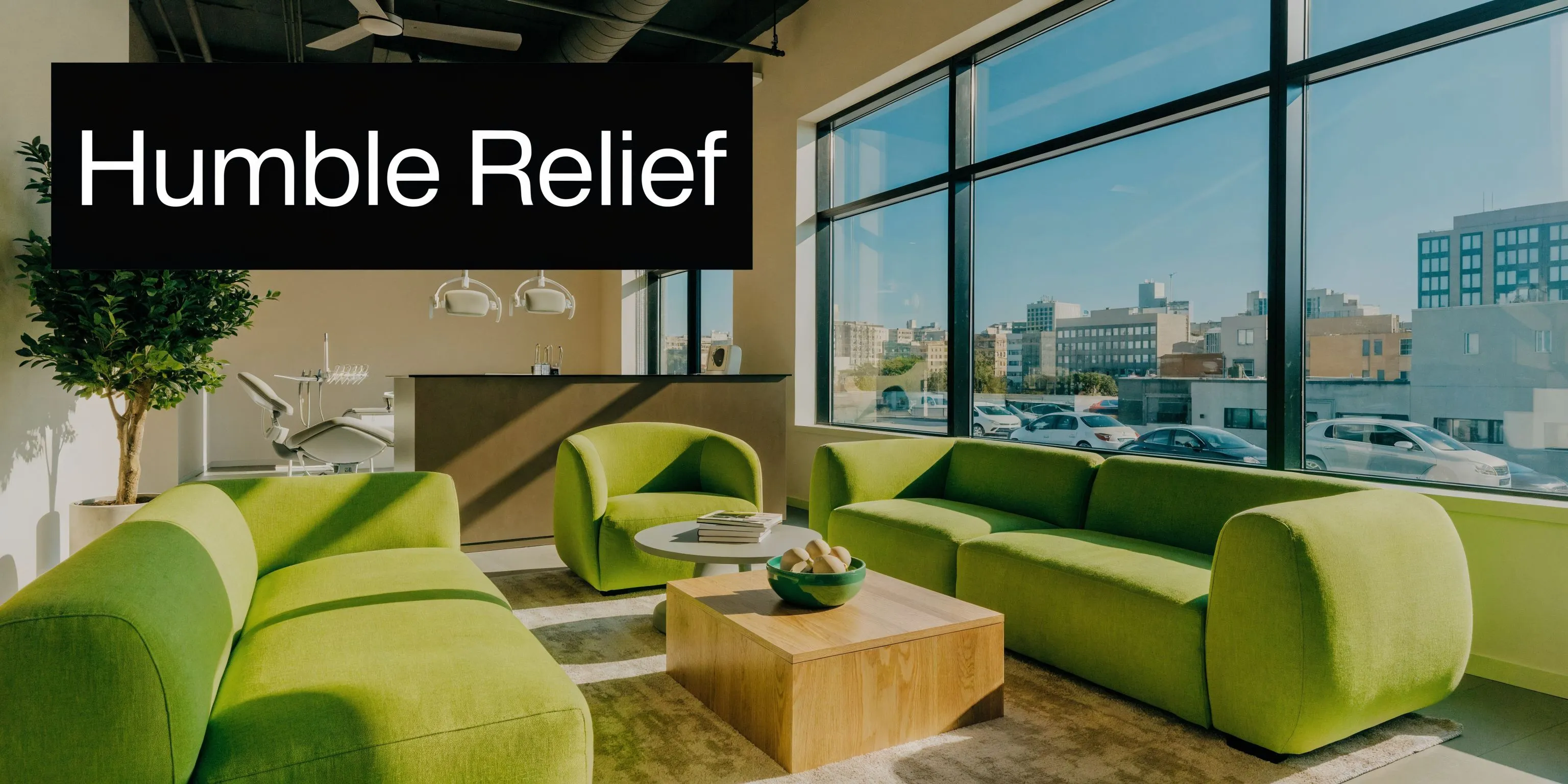 A modern and bright dental office waiting room featuring lime green sofas and a scenic city view.