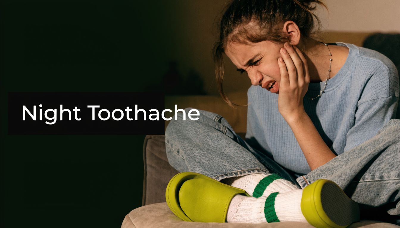 A woman sitting on a couch at night, holding her face in pain due to a toothache.
