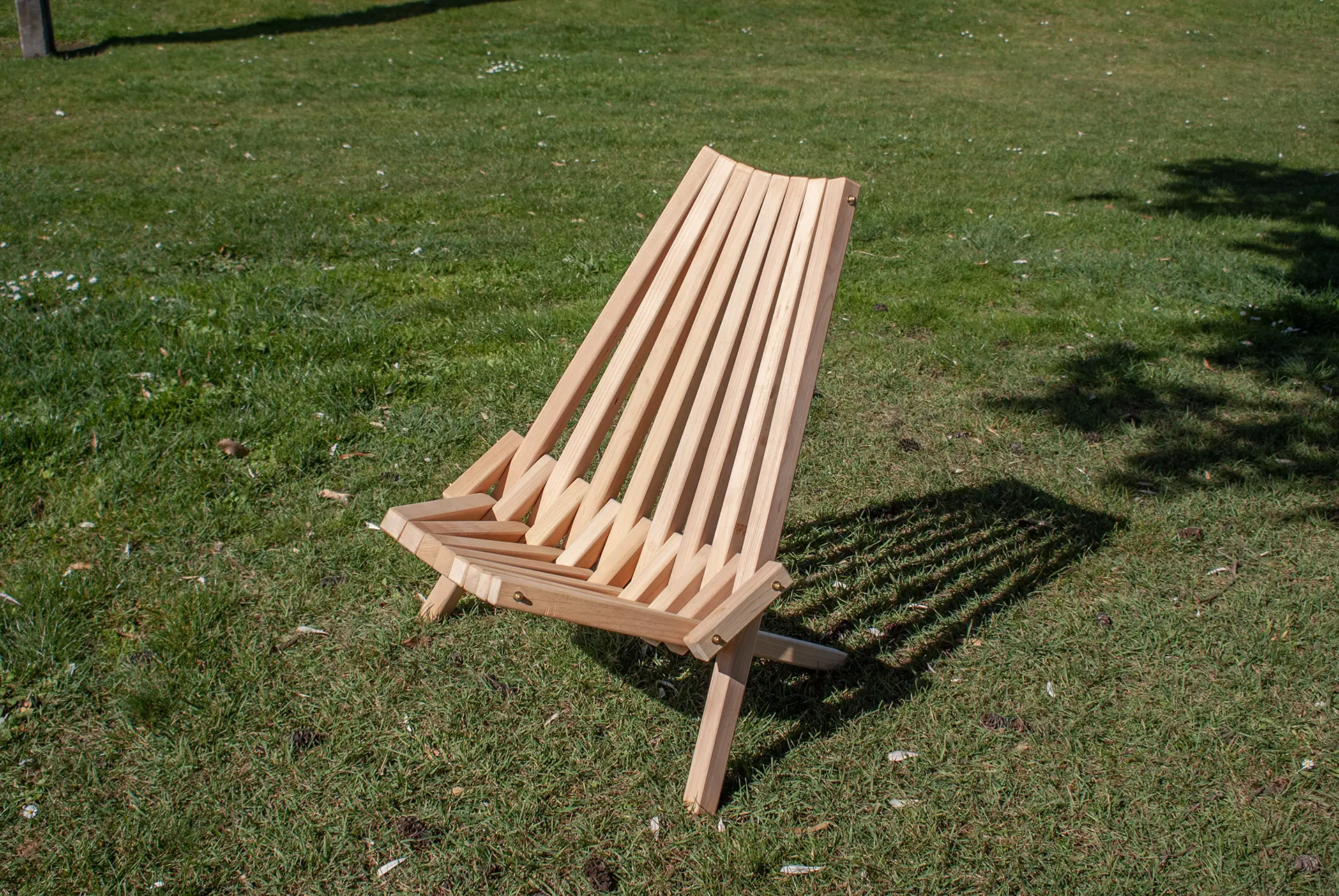 Macrocarpa outdoor lounge chair – durable solid timber design