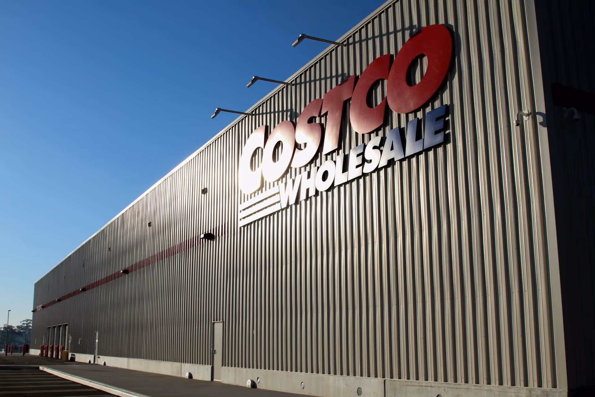 A building that has a Costco sign on the side of it.