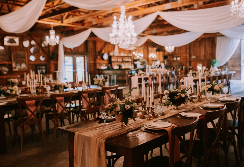 Beautiful wooded area with bridal couple at Satolah Creek Farm wedding venue in North Georgia