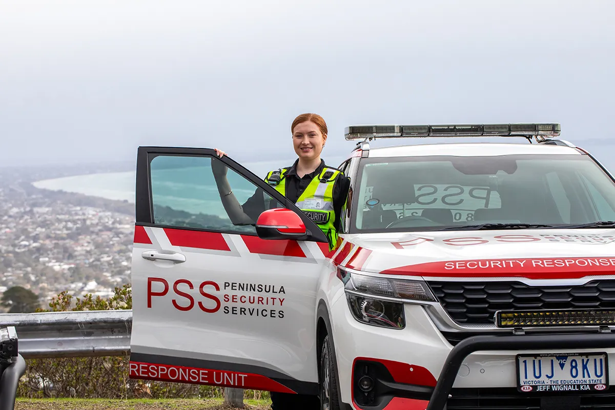Peninsula Security services vehicle and employee overlooking Mornington peninsula view point