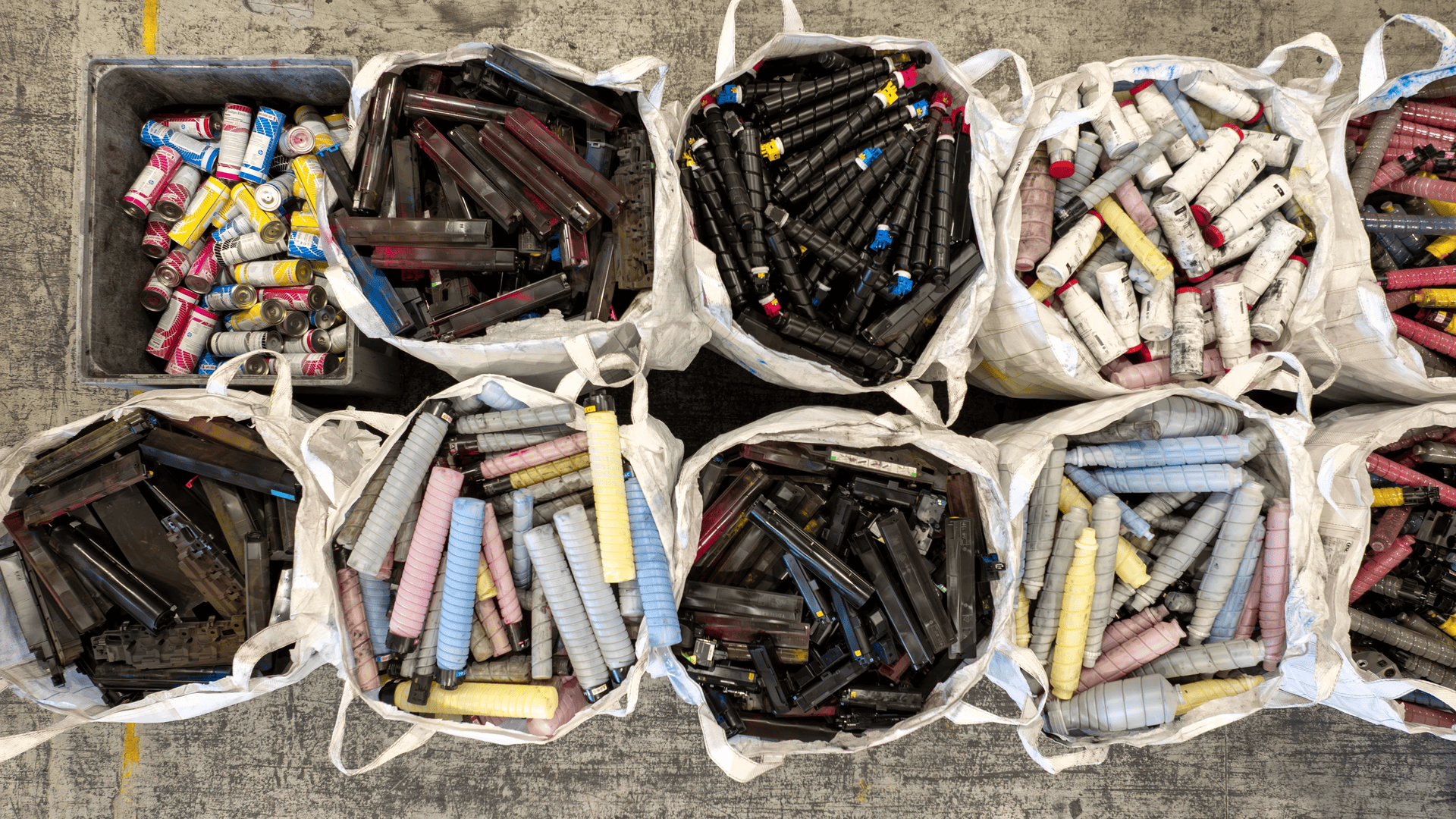 Workers sorting cartridges on the factory line