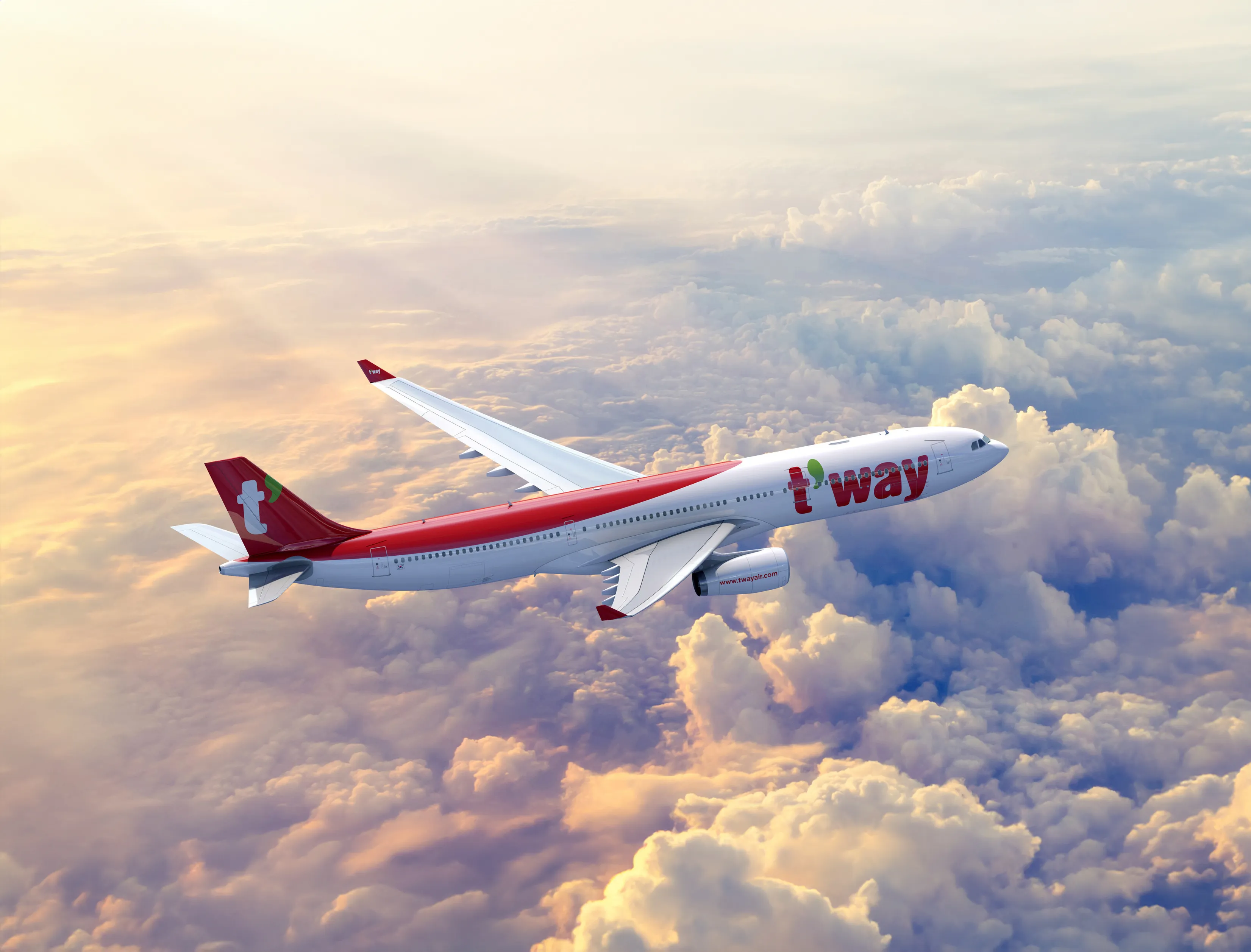 Vue depuis un hublot d’avion T’way Air au coucher du soleil, en vol vers la Corée
