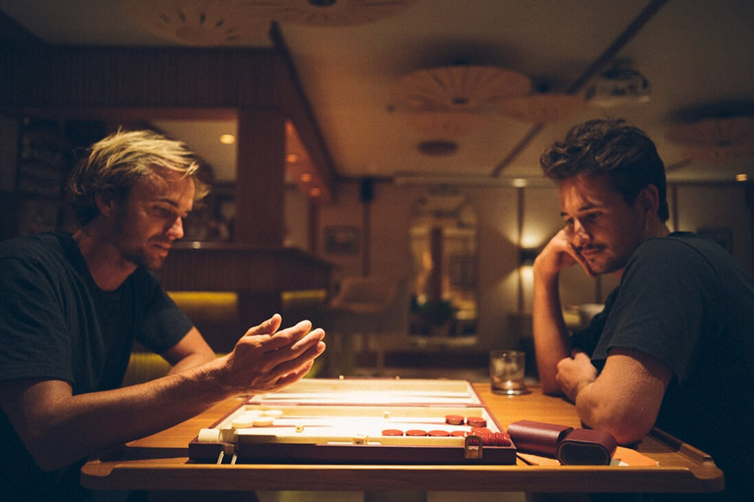Cozy indoor lounge with library and board games