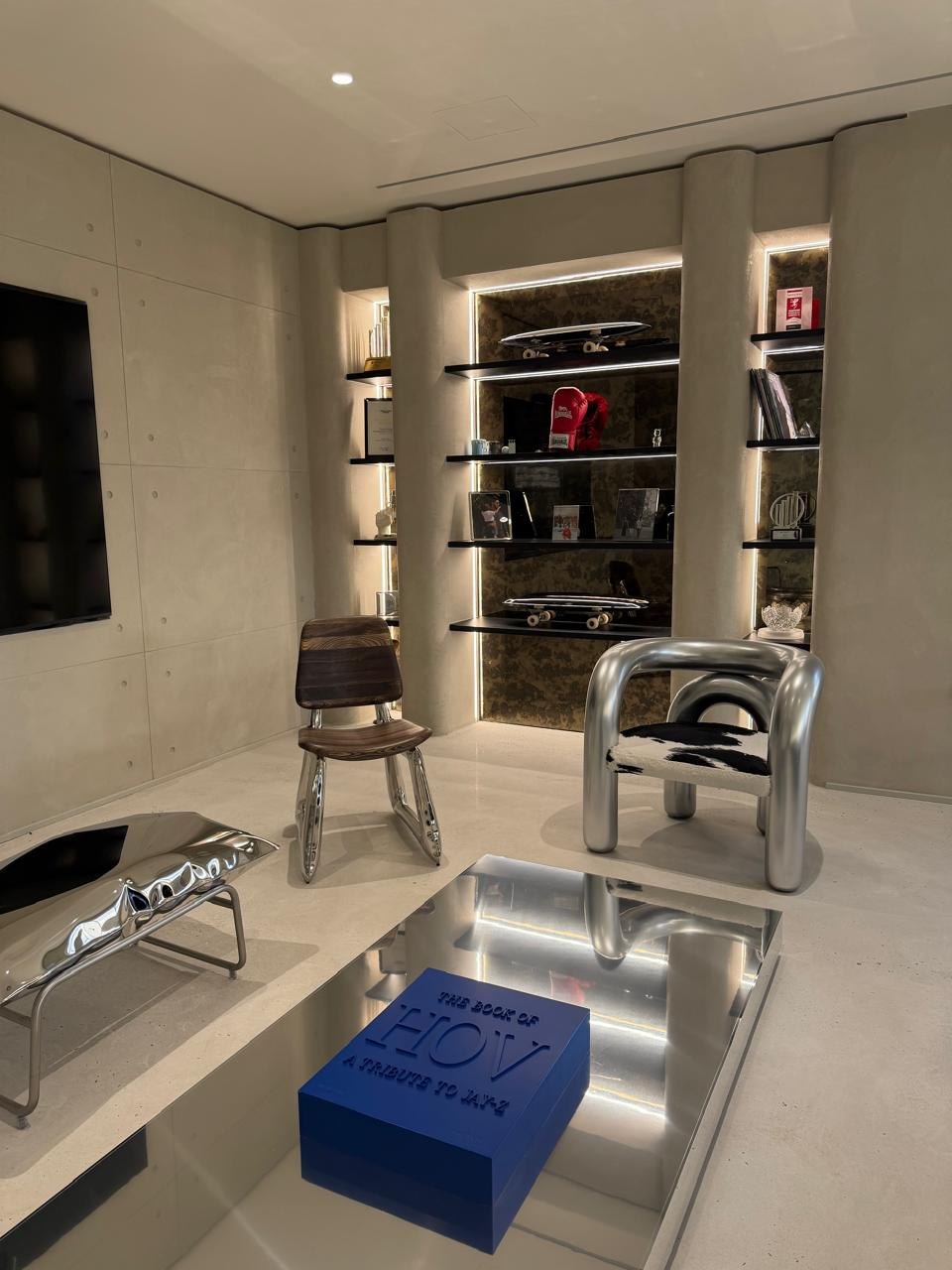 Display lounge with illuminated shelving, creative studio, JAFZA