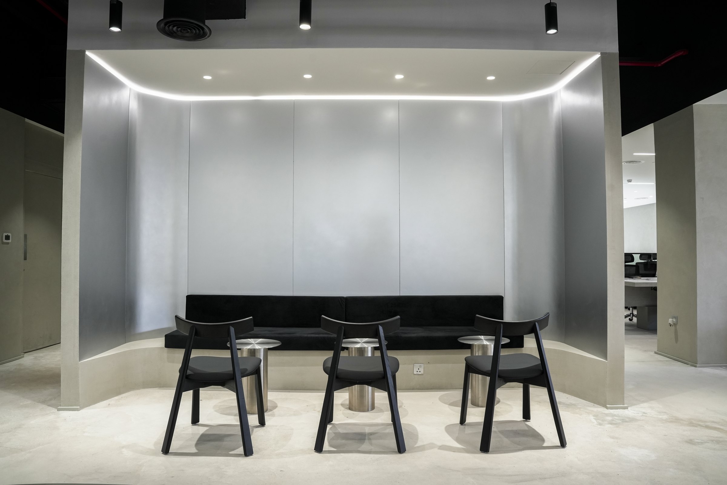 Brushed-metal seating alcove, creative studio, JAFZA