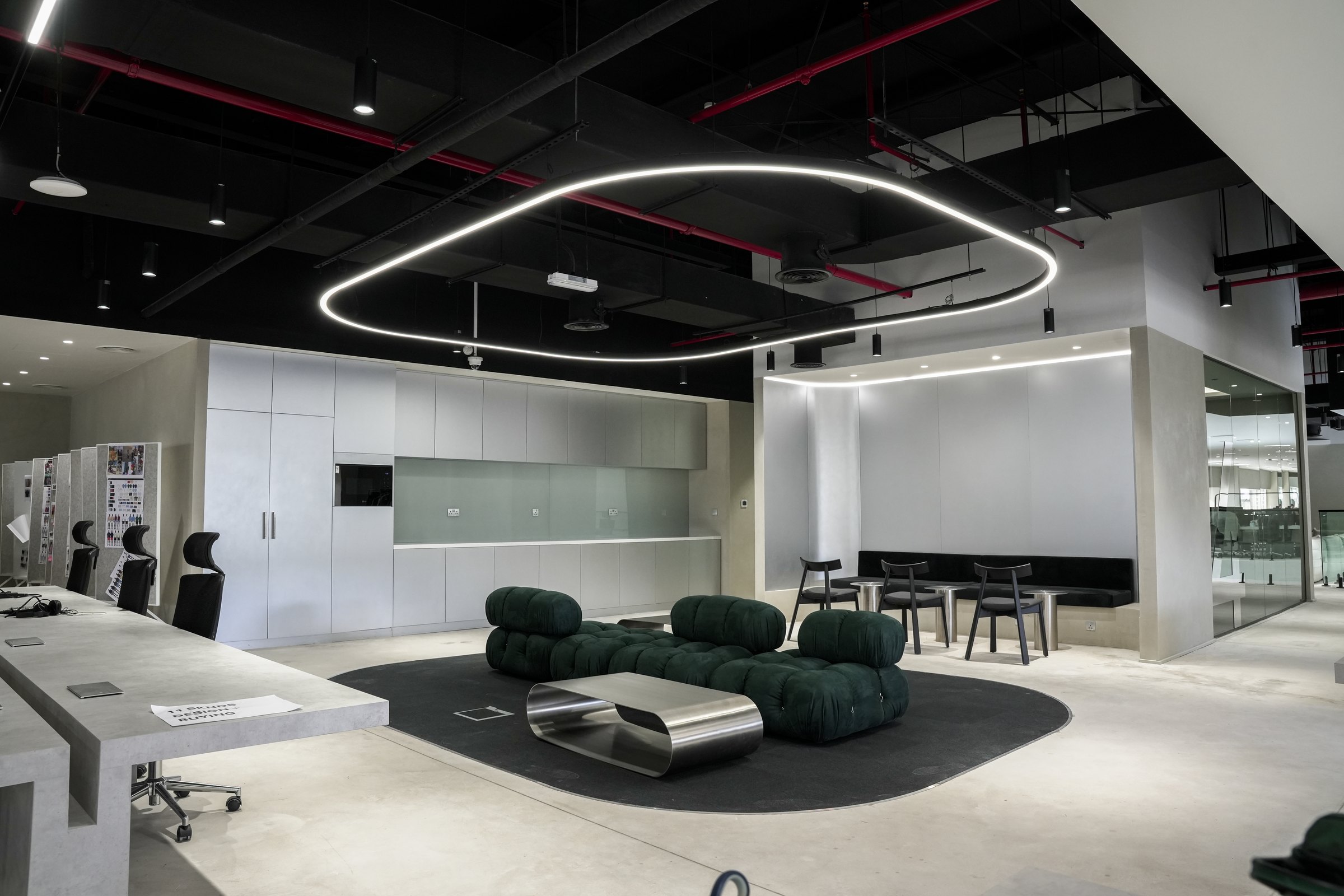 Creative studio lounge with ring pendant light, JAFZA